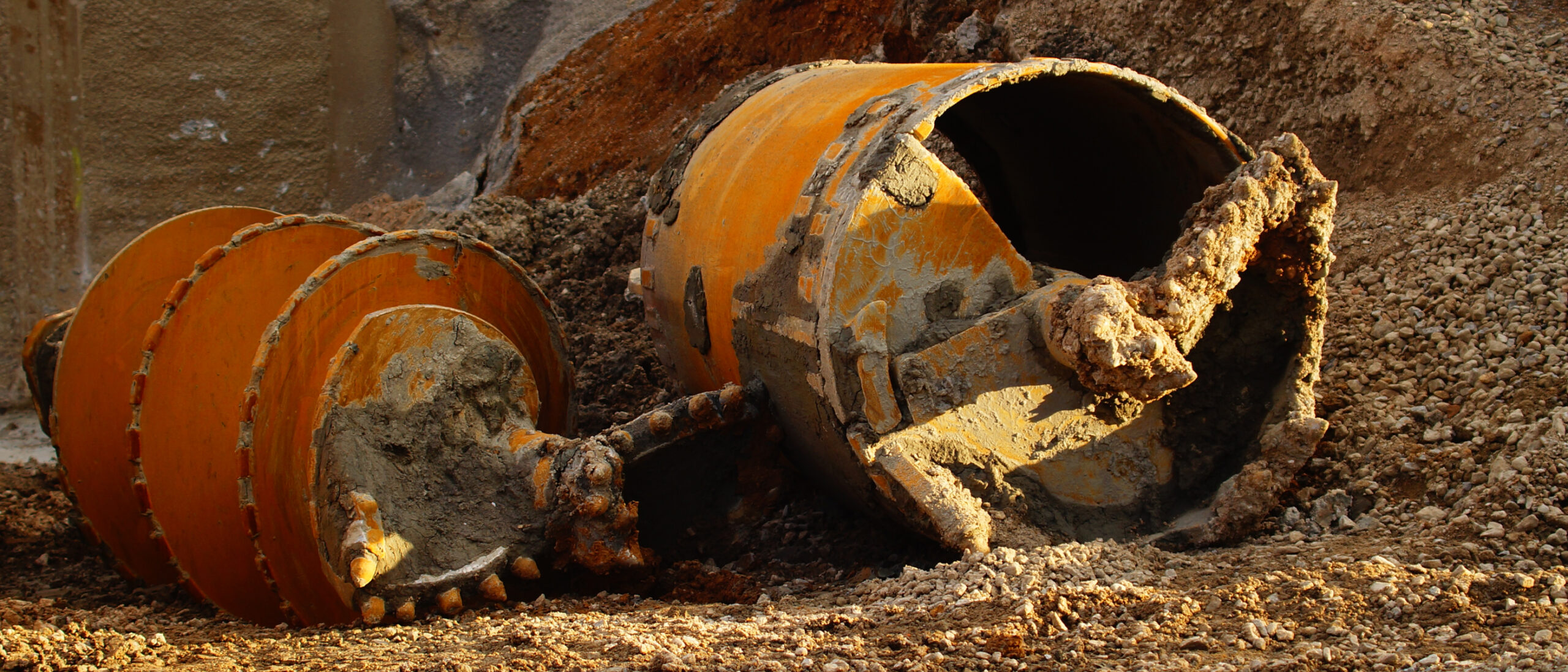 Image shows dirty, damaged and discarded construction tools